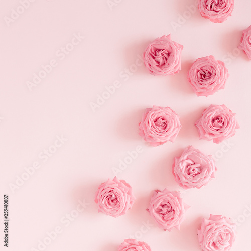 Beautiful flowers composition. Pink rose flowers on pastel pink background. Valentines Day  Easter  Birthday  Happy Women s Day  Mother s day. Flat lay  top view  copy space 