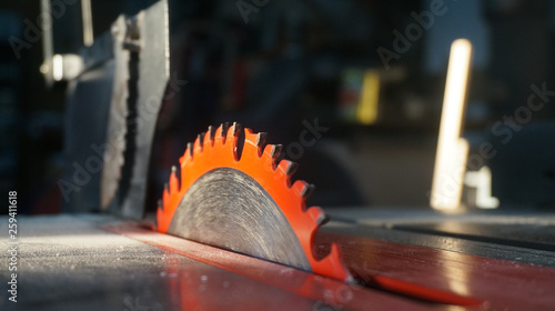 Table saw blade and dust after cutting