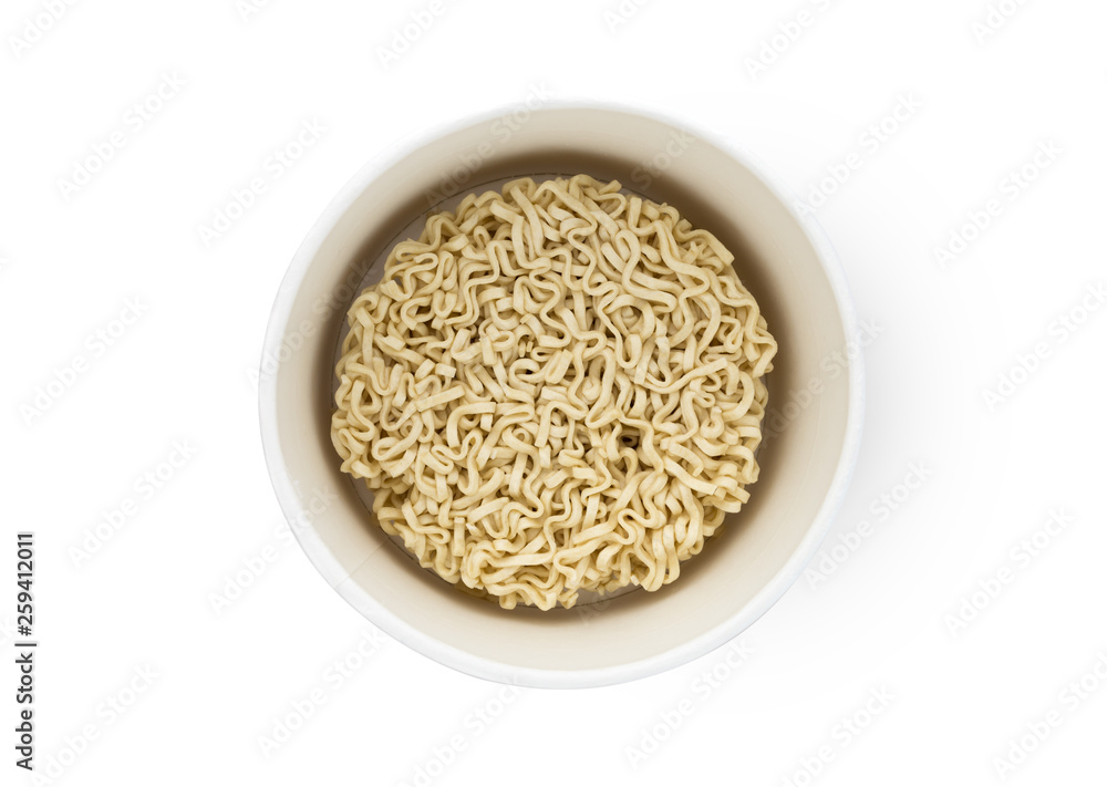 Egg noodles on a white background. Dry egg noodles in a container on a white background. Egg noodles on a white background. Dry egg noodles in a container on a white background.