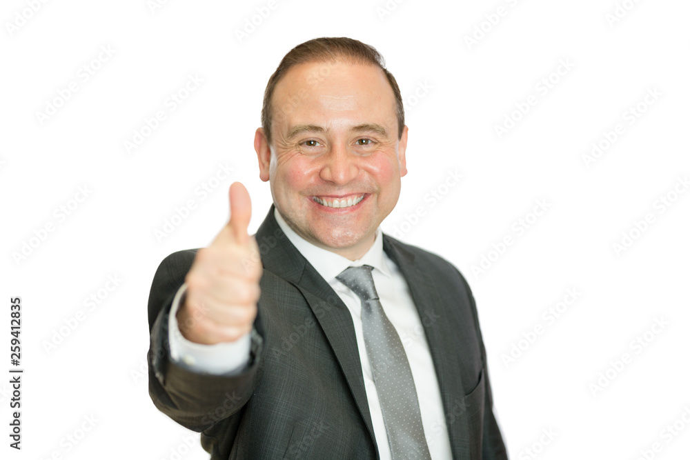 Happy businessman giving thumbs up with copy space Happy businessman giving thumbs up with copy space