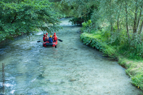 People rafting in river