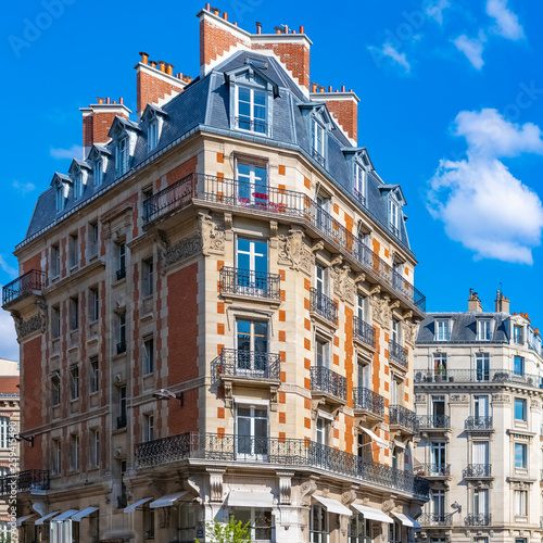Paris, beautiful building in the center, typical parisian facades and windows