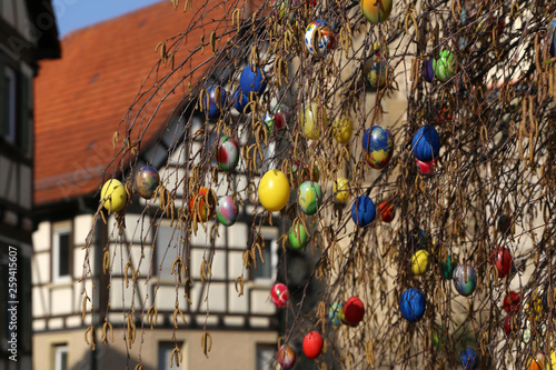 Easter eggs on a fountain in the city photo