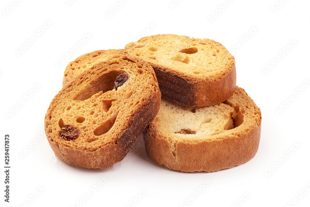 Freshly baked tasty crackers with raisins, close-up, isolated on white background