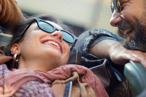 Smiling couple relaxing in car