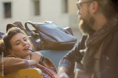 Couple relaxing in car