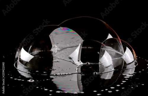 Foam bubbles isolated on black, with clipping path texture and background