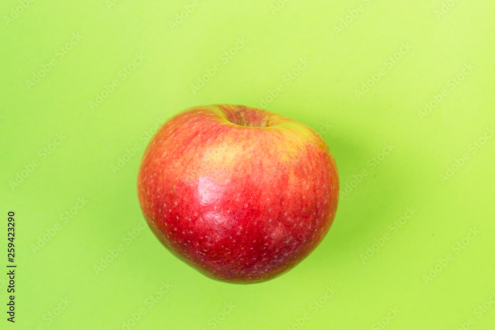 red Apple Isolated on green background red Apple Isolated on green background