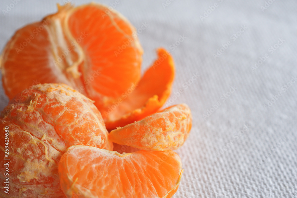 Peeled orange with slices