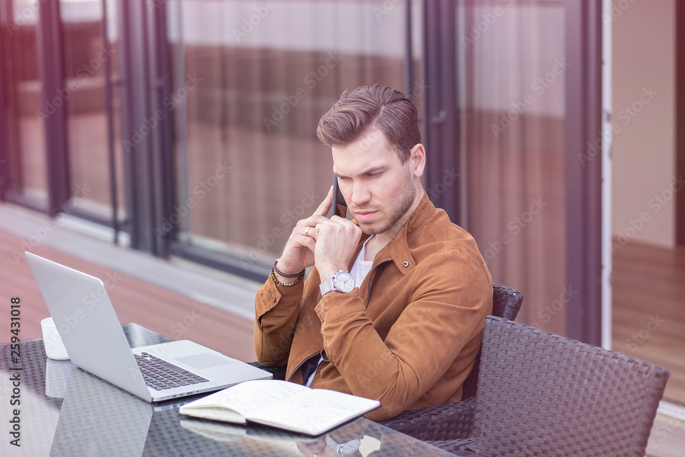 Handsome Young Adult Businessman Working Talking on Phone on Terrace Handsome Young Adult Businessman Working Talking on Phone on Terrace