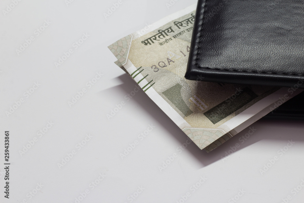 Black wallet with money isolated on white background with space for text Black wallet with money isolated on white background with space for text