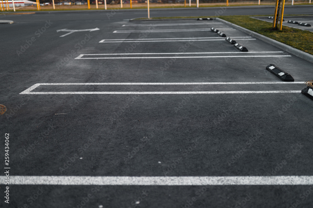 Empty parking lots during Golden Hour sunset at a popular typical Shopping centre Empty parking lots during Golden Hour sunset at a popular typical Shopping centre