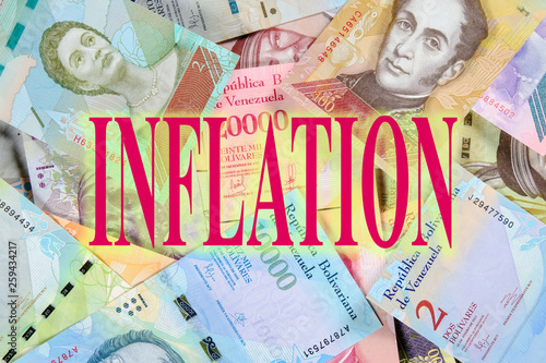 Concept of inflation in Venezuela. Bolivar paper money. Beautiful colorful bolivares close up background with title Inflation.