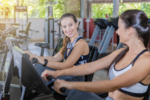 Young girls cycling in a gym