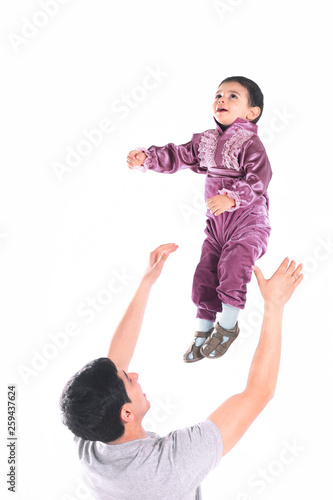 father playing with young son.isolated on a white