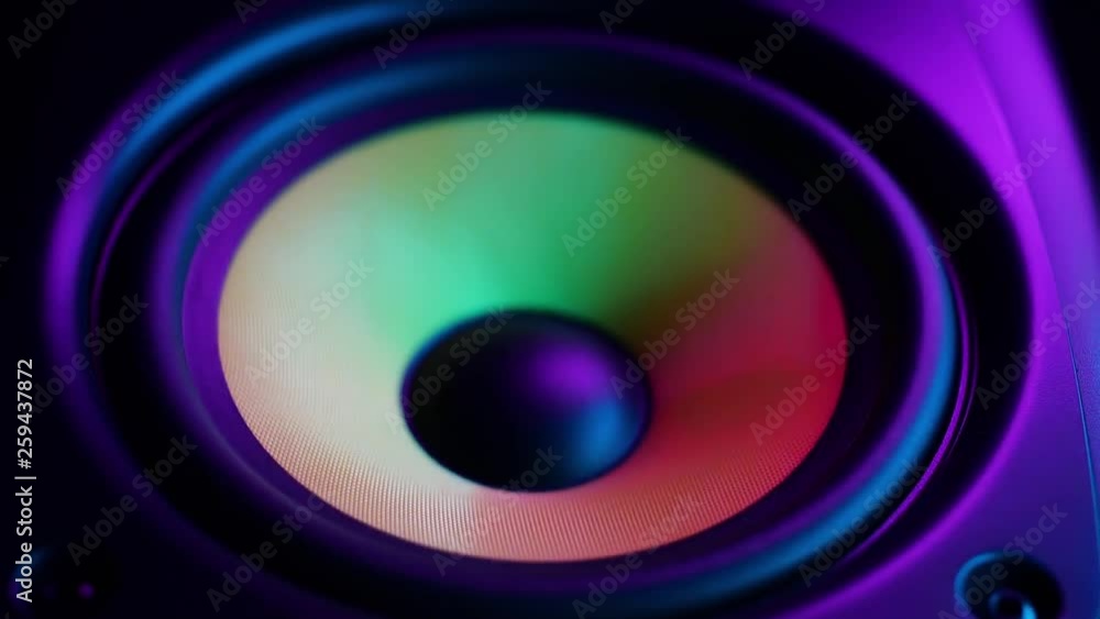 close up of a colorful loud speaker with beautiful dynamic lighting. close up of a colorful loud speaker with beautiful dynamic lighting.