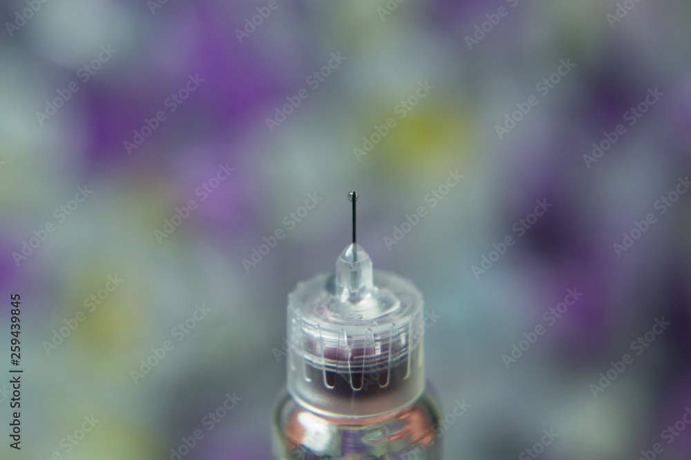 Diabetes insulin syringe with needle closeup. medicine injection Diabetes insulin syringe with needle closeup. medicine injection