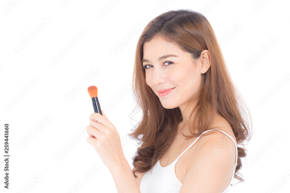 Beauty of portrait asian woman applying make up with brush of cheek isolated on white background, beautiful of girl holding blusher, skincare and cosmetic concept. Beauty of portrait asian woman applying make up with brush of cheek isolated on white background, beautiful of girl holding blusher, skincare and cosmetic concept.
