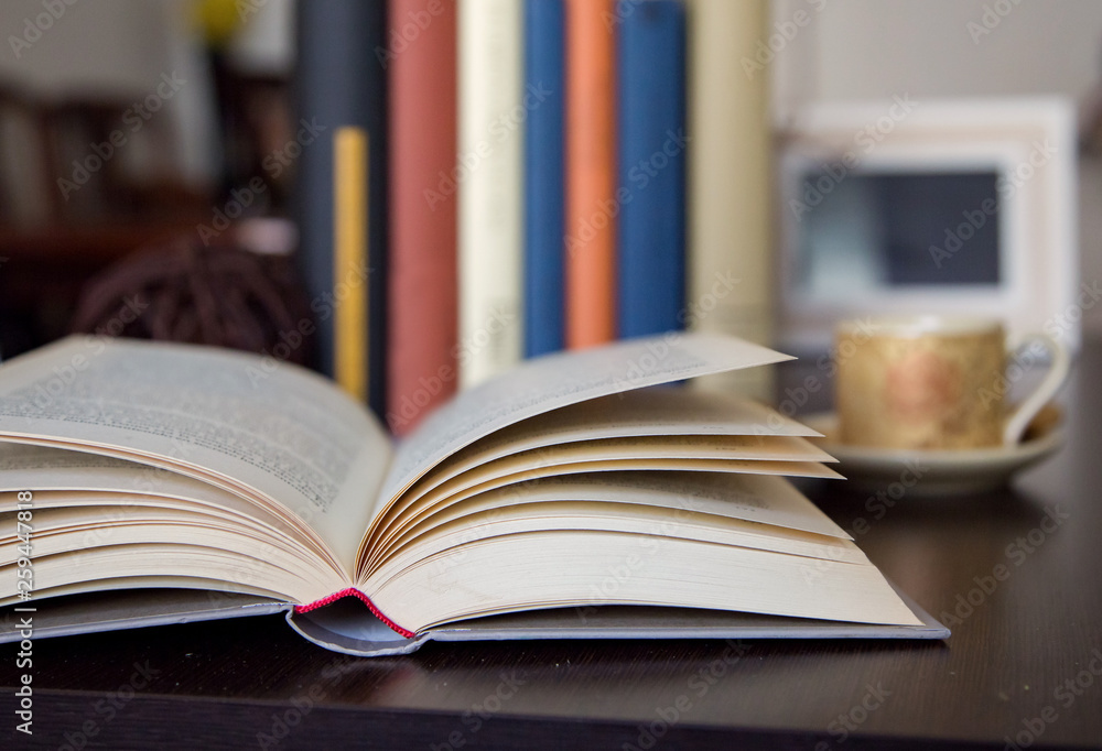 open book on wooden table detail with space to write open book on wooden table detail with space to write