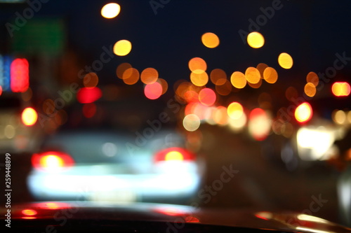 traffic jam on night street, image blur urban road background