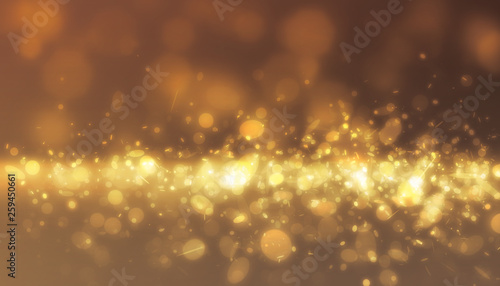 Gold glitter light flowing from side scene with soft light on gold backgrpund photo