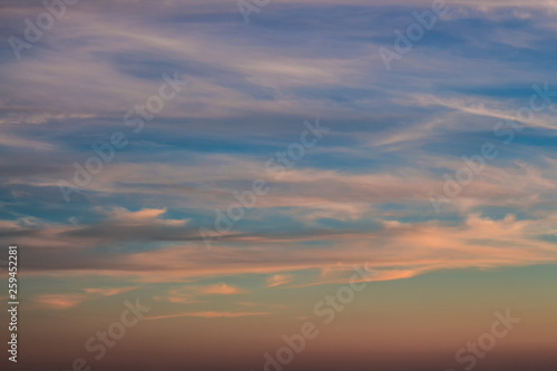 Bright orange sky at sunset. Pink clouds in the sun at dawn. © игорь соколов