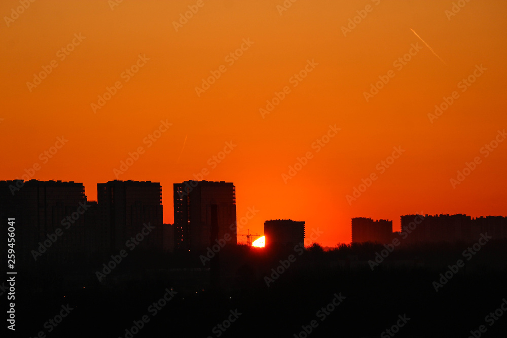 City silhouette orange dawn landscape