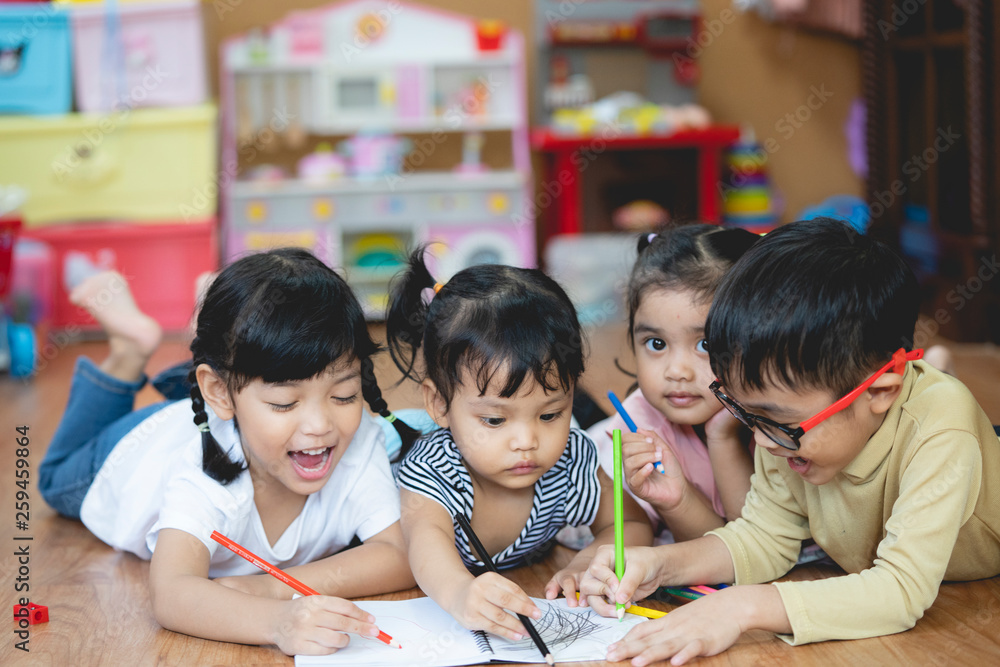 Fototapeta premium Kid Asian student doing homework .Kid enjoy learning with happiness at home. Education concept.