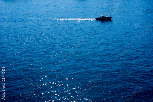 Fishing boat in the waters of sea