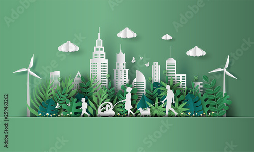 Paper art style of landscape with family enjoy fresh air in the park, save the planet and energy concept, beautiful green leaves background, flat-style vector illustration. photo