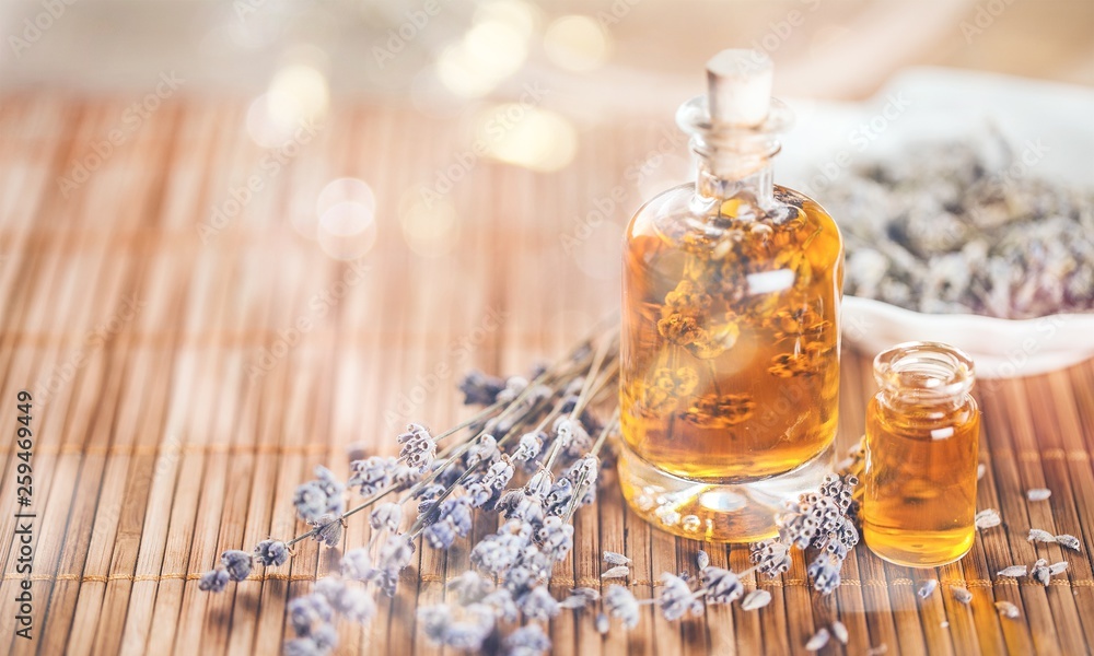 Lavender flowers and glass bottle isolated Lavender flowers and glass bottle isolated