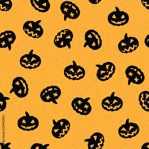 Black halloween pumpkin pattern on orange background. Halloween face black pumpkin seamless pattern.