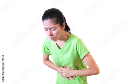 Asian women wear green shirts. Standing stomach pain from gastritis Or menstrual cramps. isolated on white background and clipping path.