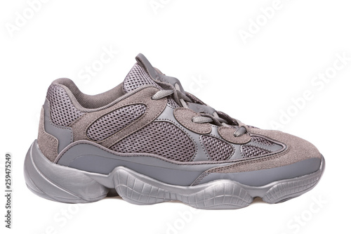 gray sneaker made of cloth mesh, on a white background, running shoes