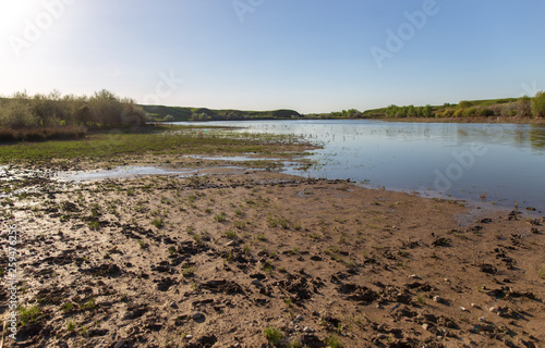 Pond in spring steppe as background