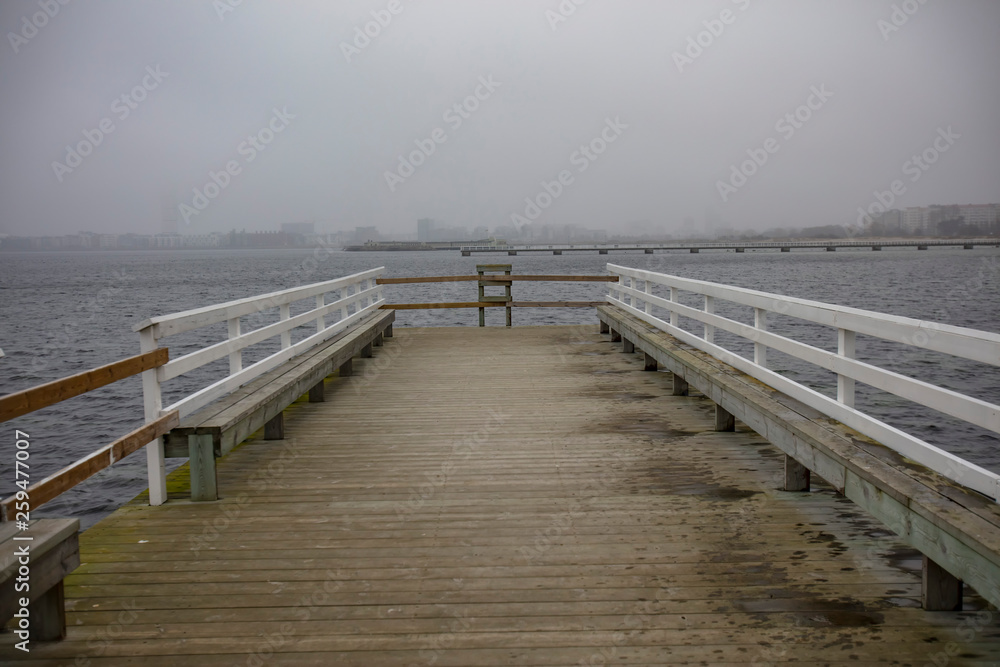 wooden pier on the winter seda
