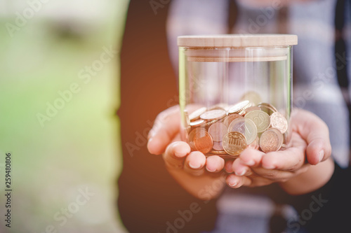 Hands and savings of close-up young women for business Business concept - image