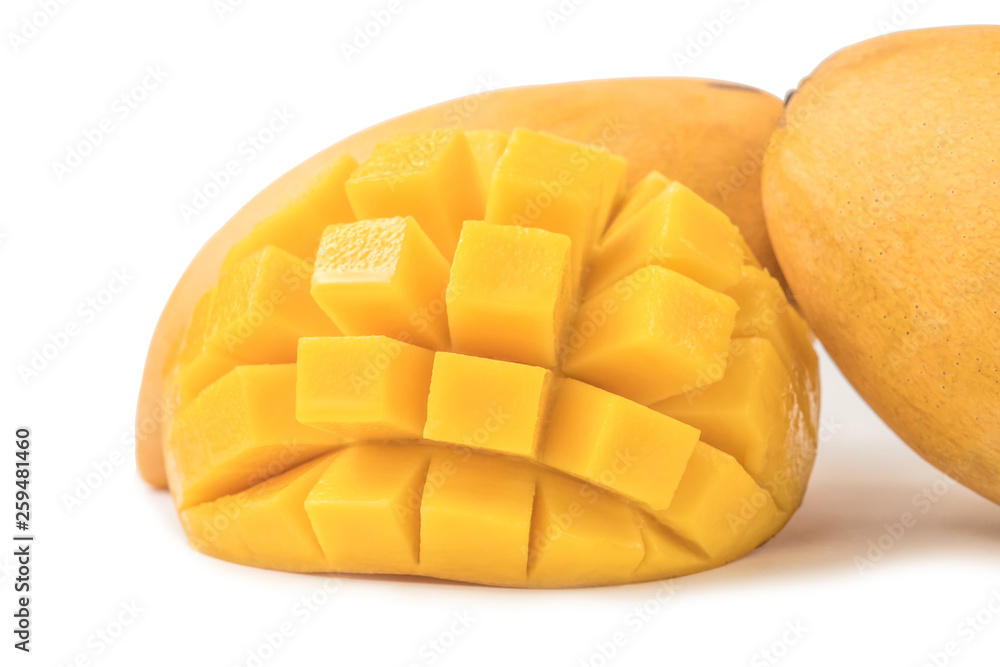 Mango fresh fruit with cubes and slices. Isolated on a white background and clipping path. Mango fresh fruit with cubes and slices. Isolated on a white background and clipping path.
