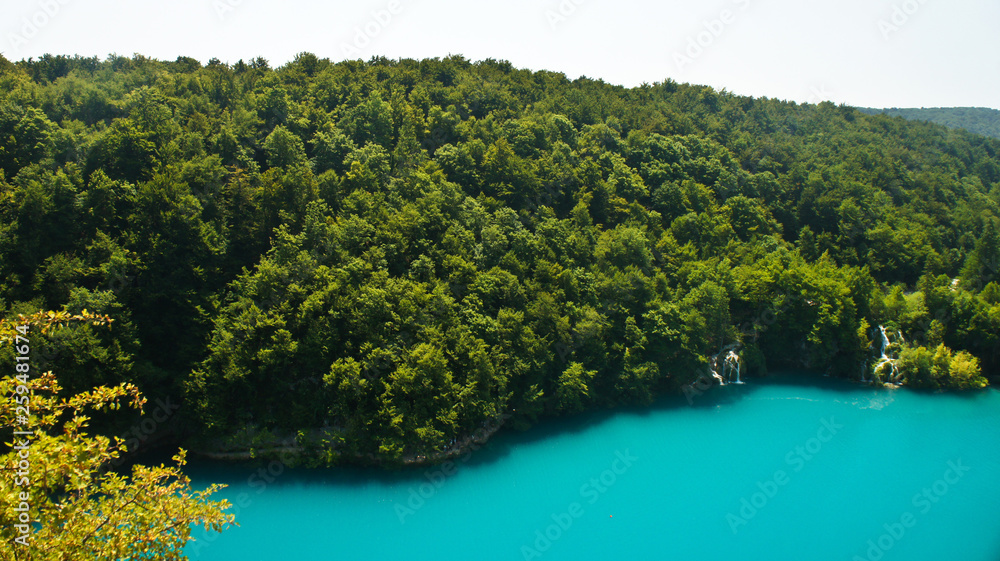Top panoramic view of Plitvice Lakes, beautiful nature of National Park in Croatia, sunny day