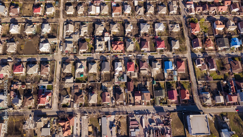 Wallpaper Mural Aerial drone flight over a suburban community on a sunny summer day. Torontodigital.ca