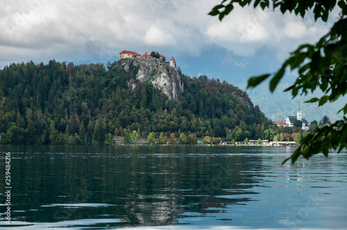 Photo of Bled Castle on rock. Lake Bled . Slovenia © vadiml