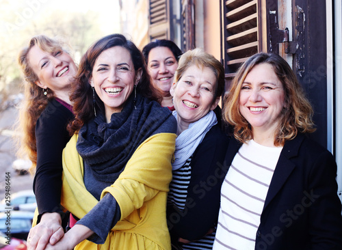 Women best friends smiling, drinking morning coffee