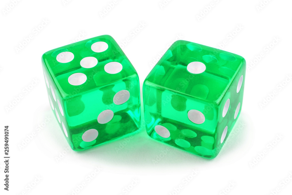 Two lollipop green dice isolated on a white background. Five and one are so close. Two lollipop green dice isolated on a white background. Five and one are so close.