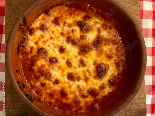 Lasagna with Bechamel Sauce in Casserole at Restaurant.