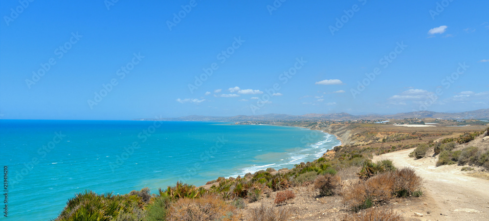Panoramic seascape. wilde nature and lonely beach in summer day in Punta Bianca beach near Agrigento, Sicily Italy