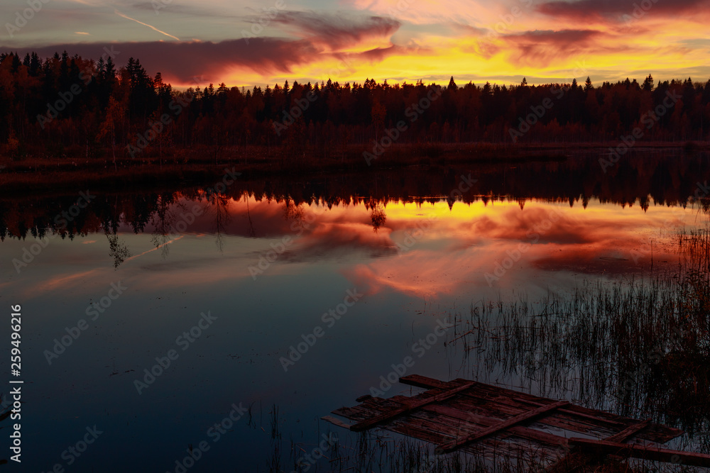 Fire Sunset on the forest lake