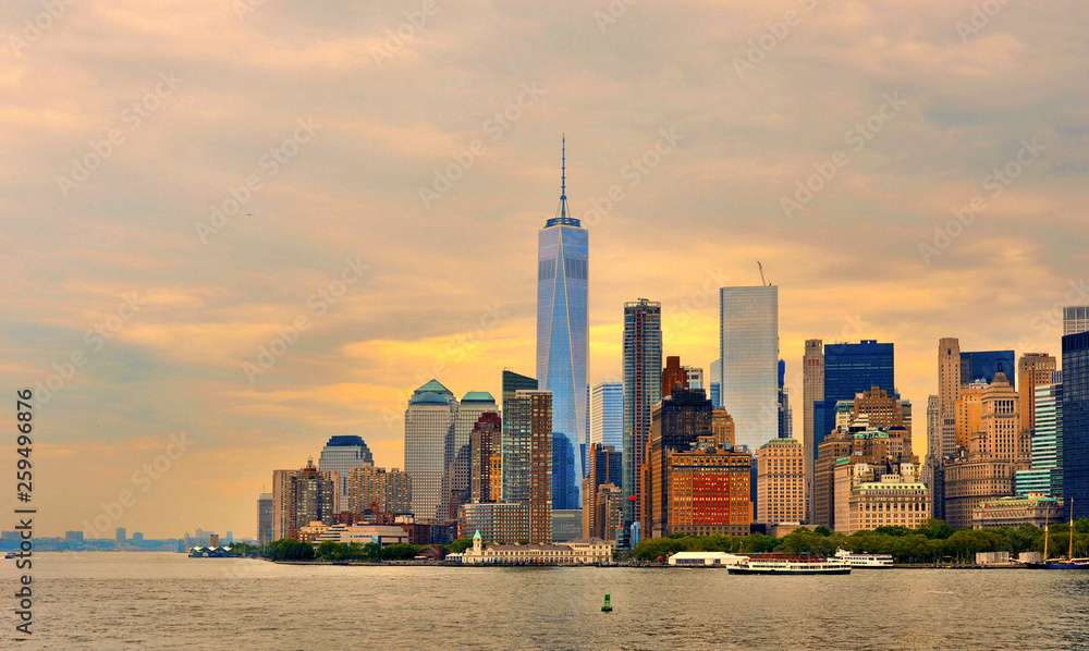 Downtown Manhattan modern skyline with skyscrapers seen from Ellis Island Ferry, panoramic view Downtown Manhattan modern skyline with skyscrapers seen from Ellis Island Ferry, panoramic view