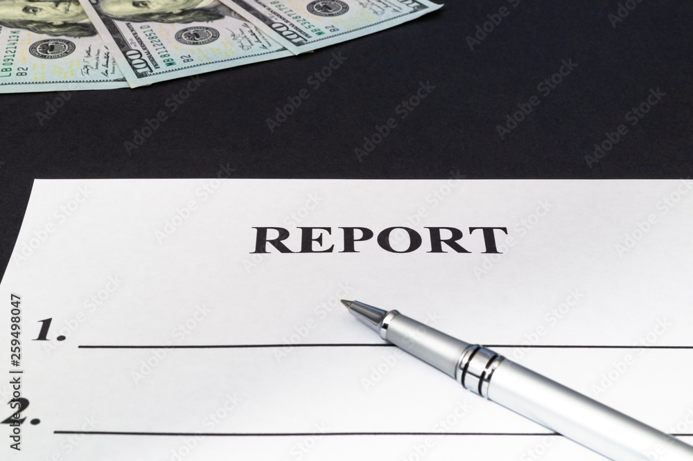 We are preparing a report - a form to fill in on a black table.