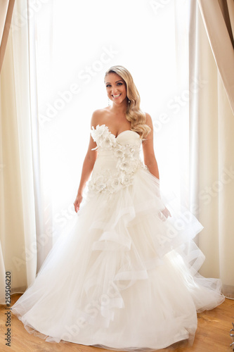 Beautiful bride posing indoor on her wedding day