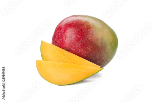 Fresh mango with two pieces isolated on white background, closeup